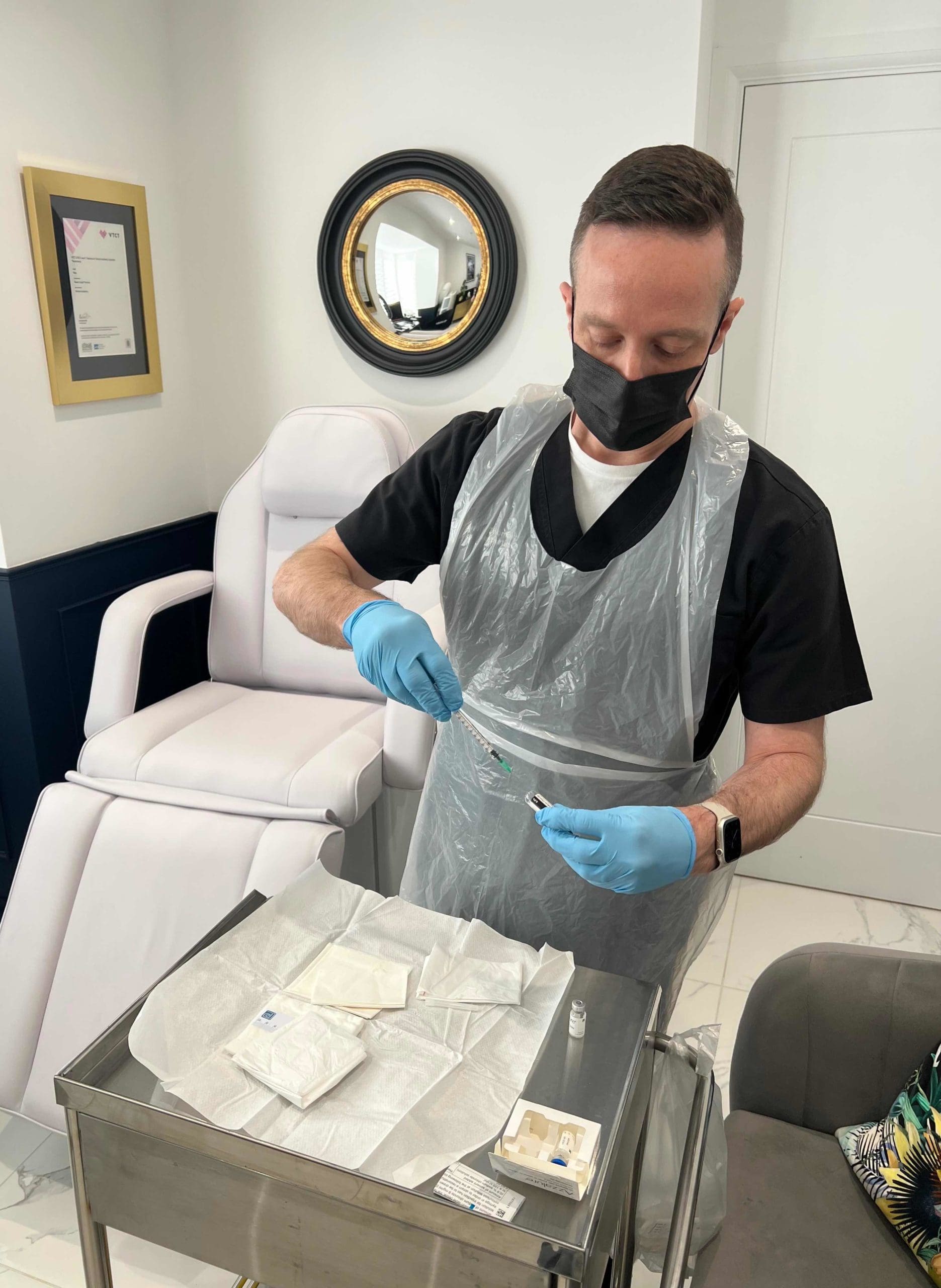 Dr Owen Thomas preparing aesthetic injections